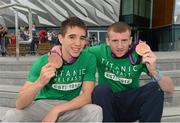 13 August 2012; Team Ireland's Michael Conlan, left, and Paddy Barnes, celebrate with their bronze medals for boxing on their arrival home from the London 2012 Olympic Games. Titanic Building, Titanic Quarter, Belfast, Co. Antrim. Picture credit: Oliver McVeigh / SPORTSFILE