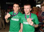 13 August 2012; Team Ireland's Michael Conlan, left, and Paddy Barnes, celebrate with their bronze medals for boxing on their arrival home from the London 2012 Olympic Games. Titanic Building, Titanic Quarter, Belfast, Co. Antrim. Picture credit: Oliver McVeigh / SPORTSFILE