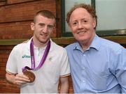13 August 2012; Team Ireland's Paddy Barnes celebrates his bronze medal with Hugh Russell, bronze medal winner at the Moscow 1980 Olympic Games, on his arrival home from the London 2012 Olympic Games. Titanic Building, Titanic Quarter, Belfast, Co. Antrim. Picture credit: Oliver McVeigh / SPORTSFILE