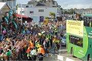 13 August 2012; Olympic champion Katie Taylor waves to supporters from the open top bus on her arrival home from the London 2012 Olympic Games makes its way along the sea front in Bray, Co. Wicklow. Picture credit: Pat Murphy / SPORTSFILE