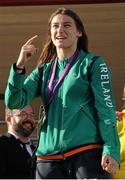 13 August 2012; Olympic champion Katie Taylor celebrates with her gold medal for boxing on her arrival home from the London 2012 Olympic Games. Bray, Co. Wicklow. Picture credit: Pat Murphy / SPORTSFILE