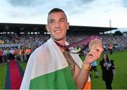 13 August 2012; Team Ireland's John Joe Nevin celebrates with his silver medal for boxing on his arrival home from the London 2012 Olympic Games. Mullingar, Co. Westmeath. Picture credit: Barry Cregg / SPORTSFILE