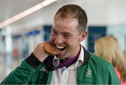 13 August 2012; Team Ireland's Cian O'Connor celebrates with his bronze medal for individual show jumping on their arrival home from the London 2012 Olympic Games. Dublin Airport, Dublin. Picture credit: Ray McManus / SPORTSFILE