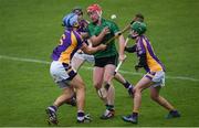 22 October 2017; Kevin Fitzgerald of Lucan Sarsfields in action against, from left, Ross O'Carroll, Caolan Conway and Lorcan McMullan of Kilmacud Crokes, during the Dublin County Senior Hurling Championship Semi-Final match between Kilmacud Crokes and Lucan Sarsfields at Parnell Park in Dublin. Photo by David Fitzgerald/Sportsfile