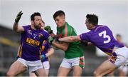 22 October 2017; Padraig Kelly of St Brigid's in action against James McDermott, left, and John McManus of Roscommon Gaels during the Roscommon County Senior Football Championship Final match between St Brigid's and Roscommon Gaels at Dr Hyde Park in Roscommon. Photo by Sam Barnes/Sportsfile