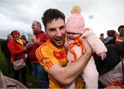 22 October 2017; Donie Newcombe of Castlebar Mitchels celebrates with his three-month-old neice Grace Malone following the Mayo County Senior Football Championship Final match between Ballintubber and Castlebar Mitchels at Elvery's MacHale Park in Castlebar, Mayo. Photo by Stephen McCarthy/Sportsfile