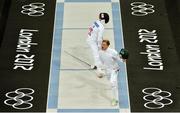 11 August 2012; Ireland's Arthur Lanigan-O’Keeffe celebrates defeating Deniss Cerkovskis, Latvia, in round 8 during the fencing discipline of the modern pentathlon. London 2012 Olympic Games, Modern Pentathlon, Copper Box, Olympic Park, Stratford, London, England. Picture credit: Brendan Moran / SPORTSFILE