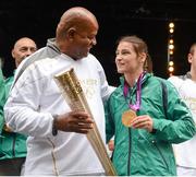 15 August 2012; Team Ireland boxing gold medallist Katie Taylor with Tony Sutherland, father of the late Darren Sutherland, a bronze medalist in boxing at the Beijing Olympic Games, during a Team Ireland London 2012 Olympic Games Public Reception. Dawson Street, Dublin. Picture credit: Stephen McCarthy / SPORTSFILE