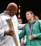 15 August 2012; Team Ireland boxing gold medallist Katie Taylor with Tony Sutherland, father of the late Darren Sutherland, a bronze medalist in boxing at the Beijing Olympic Games, during a Team Ireland London 2012 Olympic Games Public Reception. Dawson Street, Dublin. Picture credit: Stephen McCarthy / SPORTSFILE
