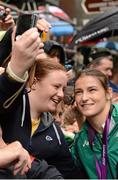 15 August 2012; Team Ireland boxing gold medallist Katie Taylor poses for pictures with fans during a Team Ireland London 2012 Olympic Games Public Reception. Dawson Street, Dublin. Picture credit: Stephen McCarthy / SPORTSFILE