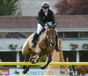 15 August 2012; Cian O'Connor, Ireland, competing on Kec Alligator Alley, jumps the 11th during the Irish Sports Council Classic. Dublin Horse Show 2012, Main Arena, RDS, Ballsbridge, Dublin. Picture credit: Matt Browne / SPORTSFILE