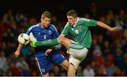 15 August 2012; Craig Cathcart, Northern Ireland, in action against Joona Toivo, Finland. Vauxhall International Challenge Match, Northern Ireland v Finland, Windsor Park, Belfast, Co. Antrim. Picture credit: Oliver McVeigh / SPORTSFILE