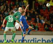 15 August 2012; Ryan McGivern, and Craig Cathcart, Northern Ireland, in action against Kasper Hamalainen, Finland. Vauxhall International Challenge Match, Northern Ireland v Finland, Windsor Park, Belfast, Co. Antrim. Picture credit: Oliver McVeigh / SPORTSFILE
