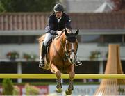 15 August 2012; Conor Swail, Ireland, competing on Lansdowne, during the Irish Sports Council Classic. Dublin Horse Show 2012, Main Arena, RDS, Ballsbridge, Dublin. Picture credit: Matt Browne / SPORTSFILE