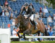 16 August 2012; Dermott Lennon, Ireland, competing on Loughview Lou Lou, jumps the 9th on their way to winning the Speed Derby. Dublin Horse Show 2012, Main Arena, RDS, Ballsbridge, Dublin. Picture credit: Matt Browne / SPORTSFILE