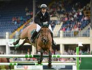 16 August 2012; Cian O'Connor, Ireland, competing on Kec Alligator Alley, jumps the 5th during the Knight Frank Speed Stakes. Dublin Horse Show 2012, Main Arena, RDS, Ballsbridge, Dublin. Picture credit: Matt Browne / SPORTSFILE