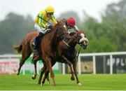 16 August 2012; Piri Wango, with Emmet McNamara up, left, on their way to winning the 'Saw Doctors' Handicap ahead of second placed Flic Flac, with Pat Smullen up. Leopardstown Racecourse, Leopardstown, Co. Dublin. Picture credit: Pat Murphy / SPORTSFILE