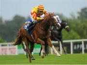 16 August 2012; Galileo Rock, with Wayne Lordan up, races clear of the field on their way to winning the Irish Stallion Farms European Breeders Fund (C & G) Maiden. Leopardstown Racecourse, Leopardstown, Co. Dublin. Picture credit: Pat Murphy / SPORTSFILE