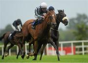 16 August 2012; Duntle, with Wayne Lordan up, races clear of the field on their way to winning the Desmond Stakes. Leopardstown Racecourse, Leopardstown, Co. Dublin. Picture credit: Pat Murphy / SPORTSFILE