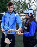 24 October 2017; Dublin hurler Eoghan O’Donnell was in Holy Spirit BNS in Ballymun today at an AIG Heroes event, with pupil Rebecca Baker, 12, from Ballymun, from Ballymun. The AIG Heroes initiative is a programme that leverages AIG’s sporting sponsorships to help provide positive role models and build confidence for young people in local communities. Photo by Sam Barnes/Sportsfile