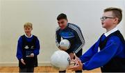 24 October 2017; Dublin footballer Paddy Andrews was in Holy Spirit BNS in Ballymun today at an AIG Heroes event with pupils Corban Murphy, 10,left, and Jamie Masterson, 10, both from Ballymun. The AIG Heroes initiative is a programme that leverages AIG’s sporting sponsorships to help provide positive role models and build confidence for young people in local communities. Photo by Sam Barnes/Sportsfile