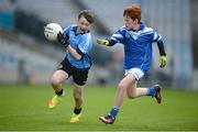 25 October 2017; Brian Stenson of Donabate Portrane Educate Together in action against Matthew O'Flynn of St. Patrick's NS Glencullen during day 1 of the Allianz Cumann na mBunscol Finals at Croke Park in Dublin. Photo by Cody Glenn/Sportsfile