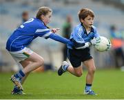 25 October 2017; Adam Conroy of Donabate Portrane Educate Together in action against Alai Gill of St. Patrick's NS Glencullen during day 1 of the Allianz Cumann na mBunscol Finals at Croke Park in Dublin. Photo by Cody Glenn/Sportsfile