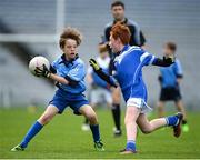 25 October 2017; Marcus Downes of Donabate Portrane Educate Together in action against Matthew O'Flynn of St. Patrick's NS Glencullen during day 1 of the Allianz Cumann na mBunscol Finals at Croke Park in Dublin. Photo by Cody Glenn/Sportsfile