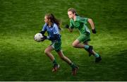 25 October 2017; Hannah Burke of Donabate Portrane Educate Together in action against Martha O'Malley of Glasnevin Educate Together during day 1 of the Allianz Cumann na mBunscol Finals at Croke Park in Dublin. Photo by Cody Glenn/Sportsfile