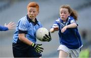 25 October 2017; Alex Manning of Donabate Portrane Educate Together in action against Ava Cannon of St. Patrick's NS Glenncullen during day 1 of the Allianz Cumann na mBunscol Finals at Croke Park in Dublin.  Photo by Cody Glenn/Sportsfile