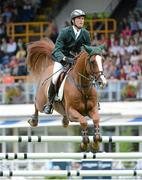 17 August 2012; Richie Moloney, Ireland, competing on Ahorn Van De Zuuthoeve, in action during the FEI Nations Cup. Dublin Horse Show 2012, Main Arena, RDS, Ballsbridge, Dublin. Picture credit: Matt Browne / SPORTSFILE
