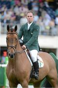 17 August 2012; Ireland's Cian O'Connor, on Blue Loyd 12, before the start of the FEI Nations Cup. Dublin Horse Show 2012, Main Arena, RDS, Ballsbridge, Dublin. Picture credit: Matt Browne / SPORTSFILE