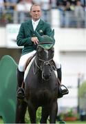 17 August 2012; Ireland's Darragh Kerins, on Lisona, before the start of the FEI Nations Cup. Dublin Horse Show 2012, Main Arena, RDS, Ballsbridge, Dublin. Picture credit: Matt Browne / SPORTSFILE