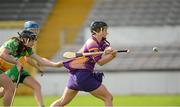 18 August 2012; Ursula Jacob, Wexford, is tackled by Sheila Sullivan, Offaly, before scoring the opening goal. All-Ireland Senior Camogie Championship Semi-Final, Wexford v Offaly, Nowlan Park, Kilkenny. Picture credit: Matt Browne / SPORTSFILE