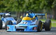 18 August 2012; Noel Roddy, Delta T79, celebrates his victory in the Historic Formula Ford 200 race. Phoenix Park Motor Races, Phoenix Park, Dublin. Picture credit: Barry Cregg / SPORTSFILE