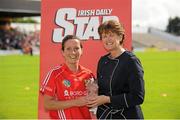 18 August 2012; Jennifer O'Leary, Cork, is presented with the player of the match award by President of the Camogie Association Aileen Lawlor. All-Ireland Senior Camogie Championship Semi-Final, Cork v Galway, Nowlan Park, Kilkenny. Picture credit: Matt Browne / SPORTSFILE