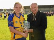 18 August 2012; Niamh O'Dea, Clare, is presented with the player of the match award by Pat Quill, President, Ladies Gaelic Football Association. TG4 All-Ireland Ladies Football Senior Championship Quarter-Final, Clare v Galway, St. Brendan's Park, Birr, Co. Offaly. Photo by Sportsfile