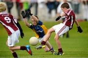 19 August 2012; Sam O'Neill, Clarinbridge, Co. Galway, in action against Christopher Brennan, Erne Valley, Co. Cavan, competing in the Gaelic Football Mixed U10, during the Community Games national finals. Athlone, Co Westmeath. Picture credit: David Maher / SPORTSFILE