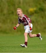 19 August 2012;  Liam Leen, Clarinbridge, Co. Galway, celebrates after scoring a goal against Erne Valley, Co. Cavan. Gaelic Football Mixed U10, during the Community Games national finals. Athlone, Co Westmeath. Picture credit: David Maher / SPORTSFILE