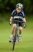 19 August 2012; Eoin Birchall, from Fermoy, Co. Cork, competing in the Boy's U.12 Cycling on Grass, during the Community Games national finals. Athlone, Co Westmeath. Picture credit: David Maher / SPORTSFILE