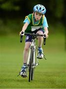 19 August 2012; Eoin Moloney, from Duagh, Co. Kerry, competing in the Boy's U.12 Cycling on Grass, during the Community Games national finals. Athlone, Co Westmeath. Picture credit: David Maher / SPORTSFILE
