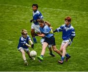 25 October 2017; Vincent Bell of Donabate Portrane Educate Together in action against Jack Keane of St. Patrick's NS Glencullen during day 1 of the Allianz Cumann na mBunscol Finals at Croke Park, in Dublin. Photo by Cody Glenn/Sportsfile