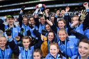 25 October 2017; Abby McMahon, with cup, and her Donabate Portrane Educate Together team-mates celebrate during day 1 of the Allianz Cumann na mBunscol Finals at Croke Park, in Dublin. Photo by Cody Glenn/Sportsfile