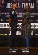 26 October 2017; Anthony Joshua and Carlos Takam square off following a press conference at the National Museum Cardiff, ahead of their World Heavyweight Championship bout, on October 28, at the Principality Stadium in Cardiff, Wales. Photo by Stephen McCarthy/Sportsfile