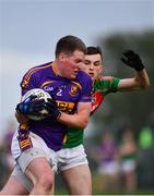 22 October 2017;  Liam McNeela of Roscommon Gaels in action against Brian Stack of St Brigid's during the Roscommon County Senior Football Championship Final match between St Brigid's and Roscommon Gaels at Dr Hyde Park in Roscommon. Photo by Sam Barnes/Sportsfile