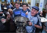 26 October 2017; Dublin footballers Michael Fitzsimons and Colm Basquel with Joesph Deegan, from Walkinstown, Dublin, during a Dublin Football squad visit the Capuchin Day Centre at Bow Street in Dublin. Photo by Eóin Noonan/Sportsfile