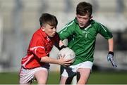 27 October 2017; Sean O Conghaile of Gaelscoil Chluain Dolcain in action against Dylan Whyte of Clonburris, during day 3 of the Allianz Cumann na mBunscol Finals at Croke Park, in Dublin. Photo by David Fitzgerald/Sportsfile