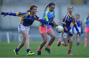 27 October 2017; Sophie Ni Mhathuna of Scoil Bhride Raghnallach in action against Amy Brennan of St. Patrick's GNS during day 3 of the Allianz Cumann na mBunscol Finals at Croke Park, in Dublin. Photo by David Fitzgerald/Sportsfile