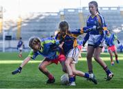 27 October 2017; Sinead Ni Mhaoldomhnaigh of Scoil Bhride Raghnallach in action against Tara Meaney of St. Patrick's GNS during day 3 of the Allianz Cumann na mBunscol Finals at Croke Park, in Dublin. Photo by David Fitzgerald/Sportsfile