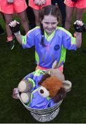 27 October 2017; Ellen Ni Dhrisceoil of Scoil Bhride Raghnallach puts her teddy bear in the Sam Maguire cup, during day 3 of the Allianz Cumann na mBunscol Finals at Croke Park, in Dublin. Photo by David Fitzgerald/Sportsfile